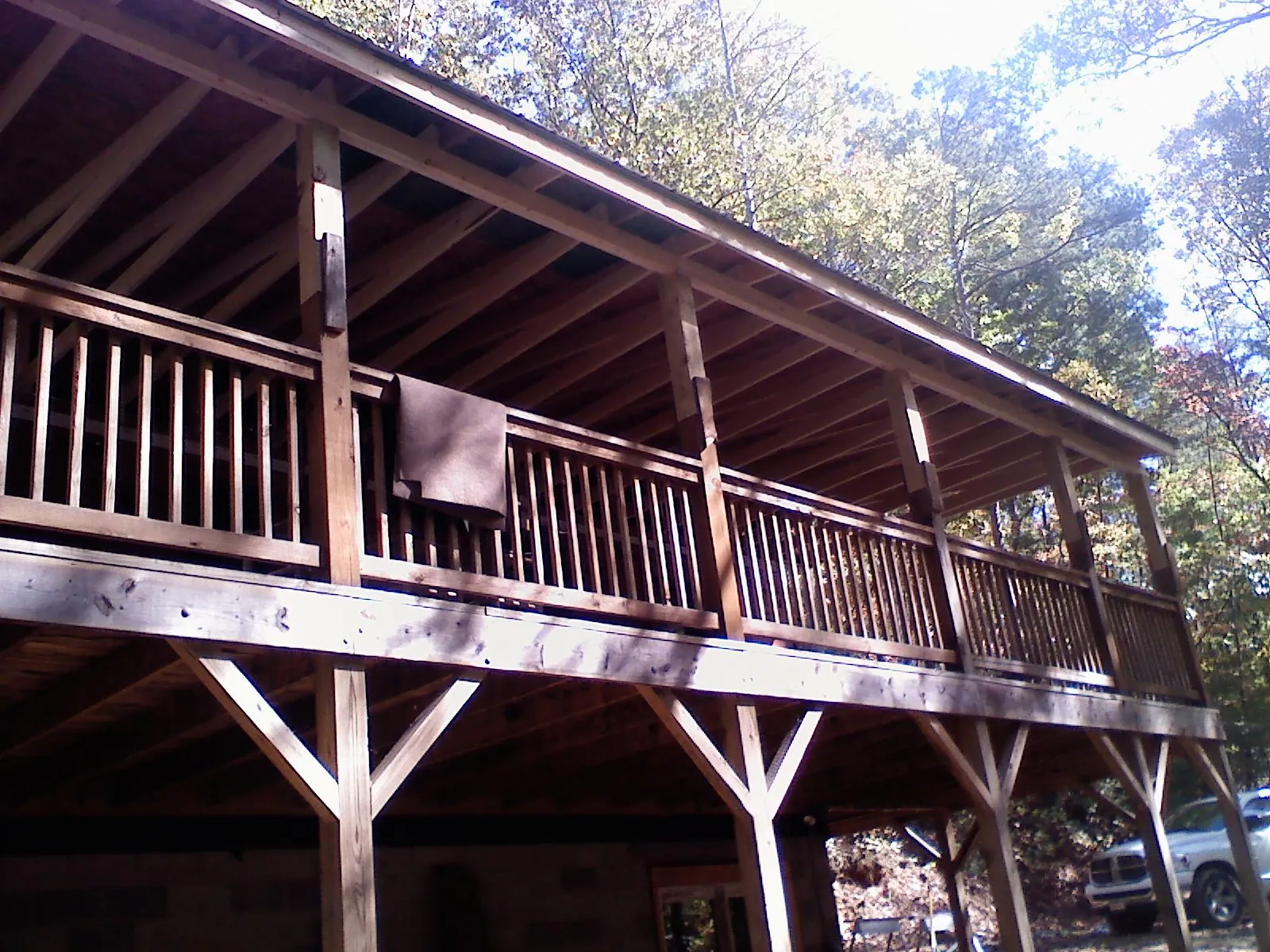 Timber framing under a new elevated porch and deck — Roof Leak Repair in Eupora by Roofing Brothers